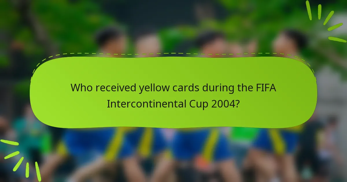 Who received yellow cards during the FIFA Intercontinental Cup 2004?